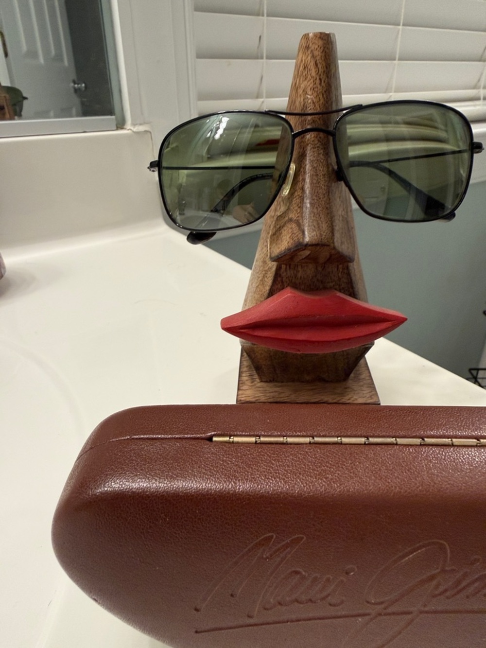 Maui Jim Black Frame Sunglasses with Green Lenses